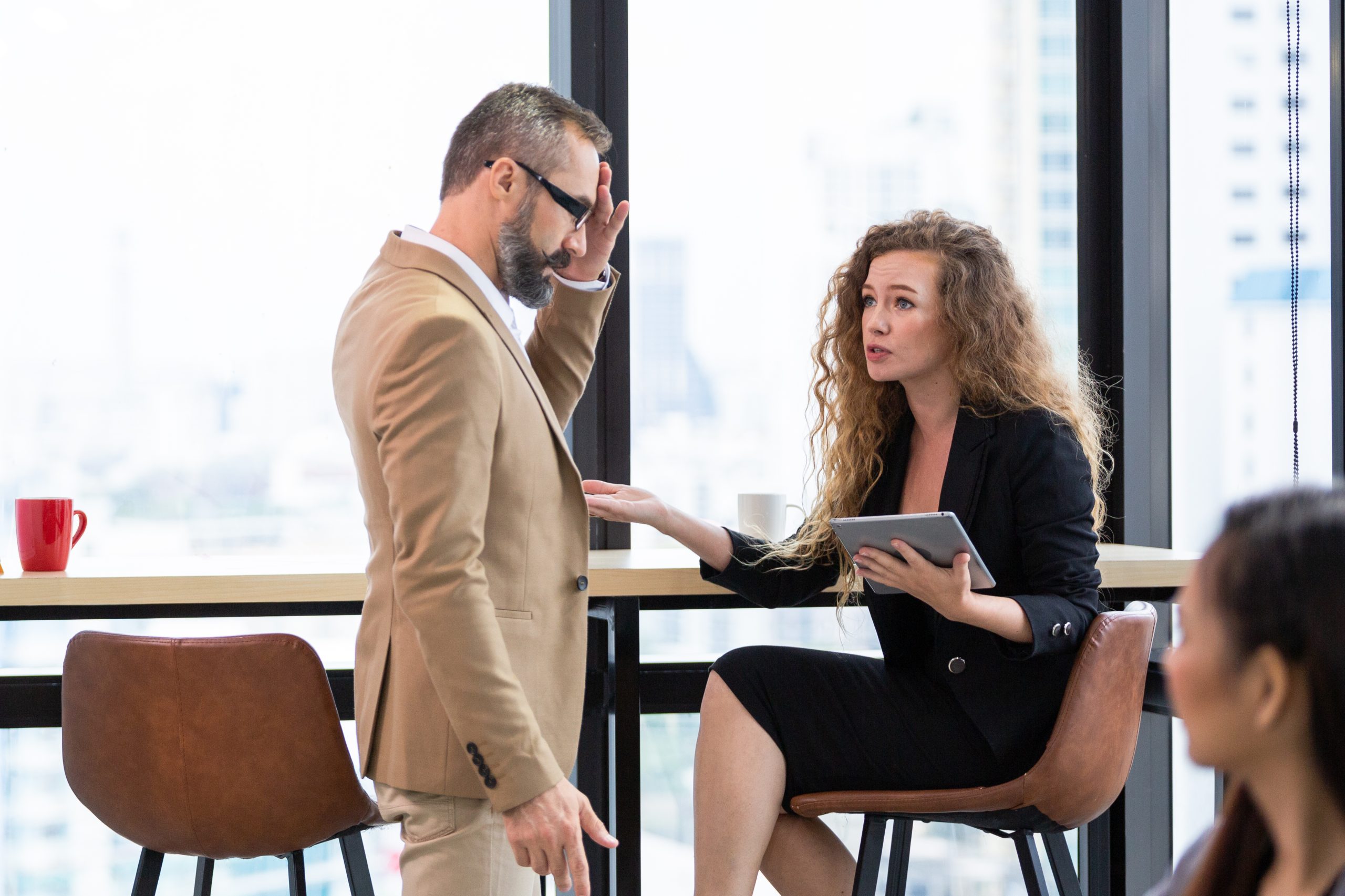 Female customer or colleague complaining work with male manager Female coworker arguing with male coworker