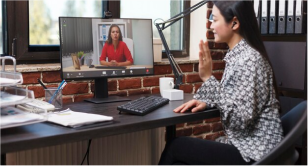 Employee's Working remotely from home having a virtual meeting