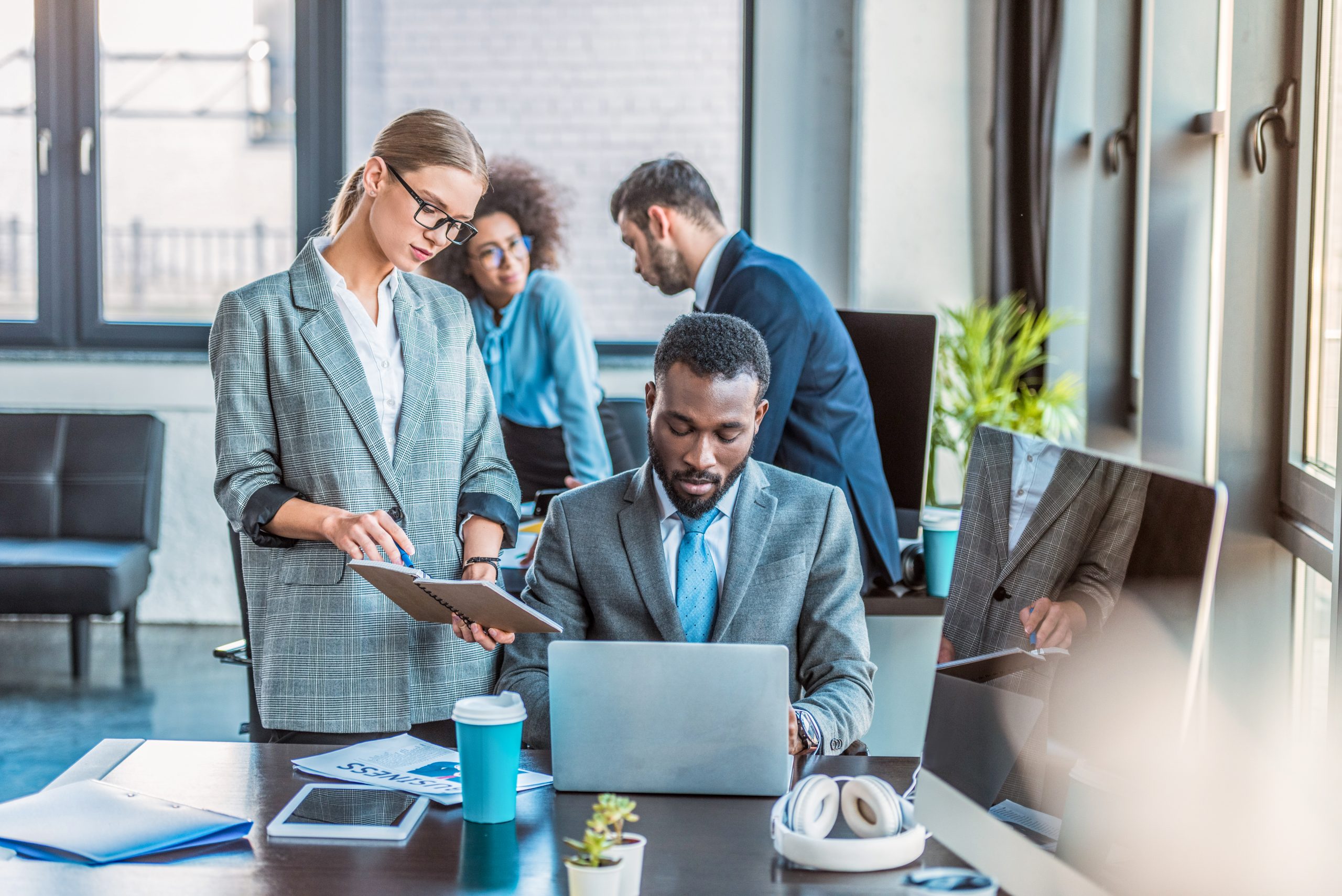 young multicultural businesspeople working in office